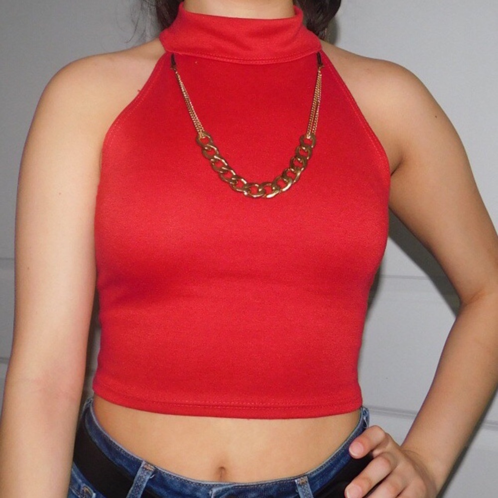 Cute red top with gold necklace attached